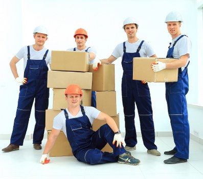 Packed office boxes and equipment ready for a commercial move