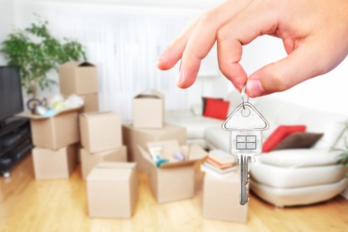 Trained removal staff handling furniture carefully in Bermondsey