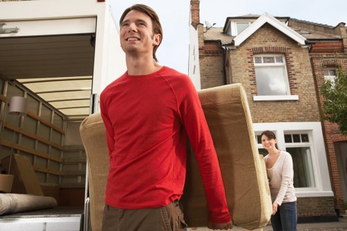 Professional piano transport through a Bermondsey street access point