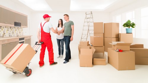Loading furniture and boxes into a removals truck