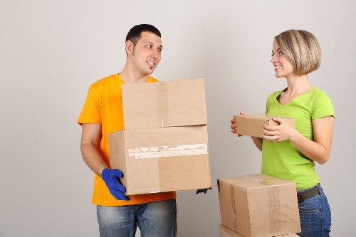Professional movers loading furniture during a Bermondsey home relocation