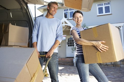 Local movers preparing furniture for safe delivery and placement